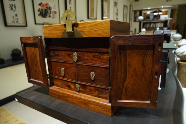 Reddish Hardwood Cabinet With Drawers