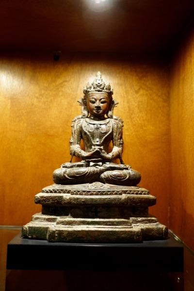 Seated Crowned Figure On Pedestal